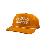 "SKIING IS EASY" | HAT (RUST)