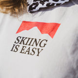 "SKIING KILLS" VINTAGE TEE | (OFF-WHITE)