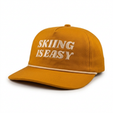 "SKIING IS EASY" | HAT (RUST)